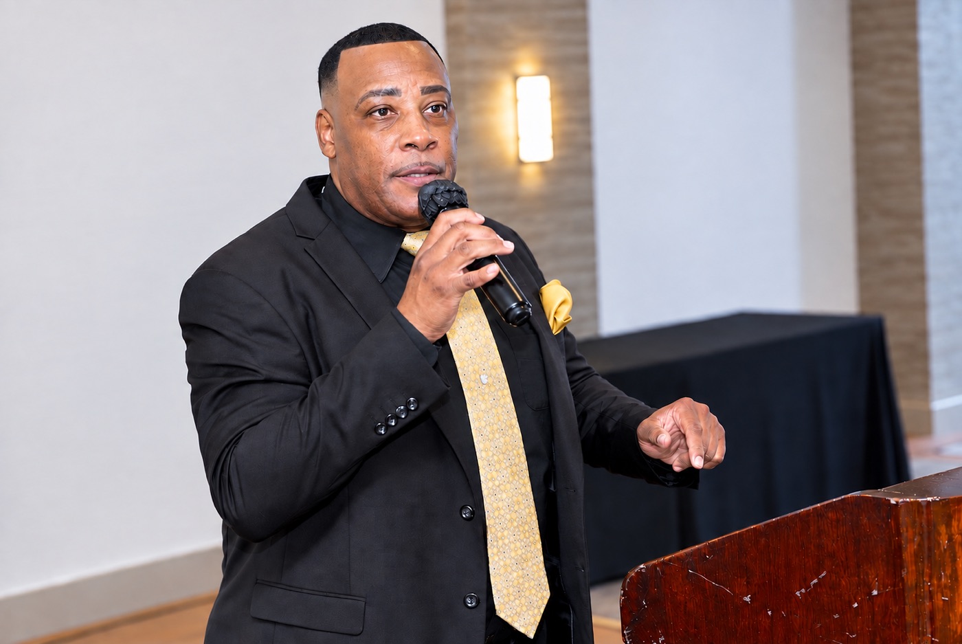 Reverend Marcus Debnam speaking at the luncheon